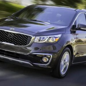 Rent KIA Sedona Van with Driver in Dubai Abu Dhabi Sharjah UAE Best Cheap Rate Price Charges Book Hourly Daily Weekly Monthly